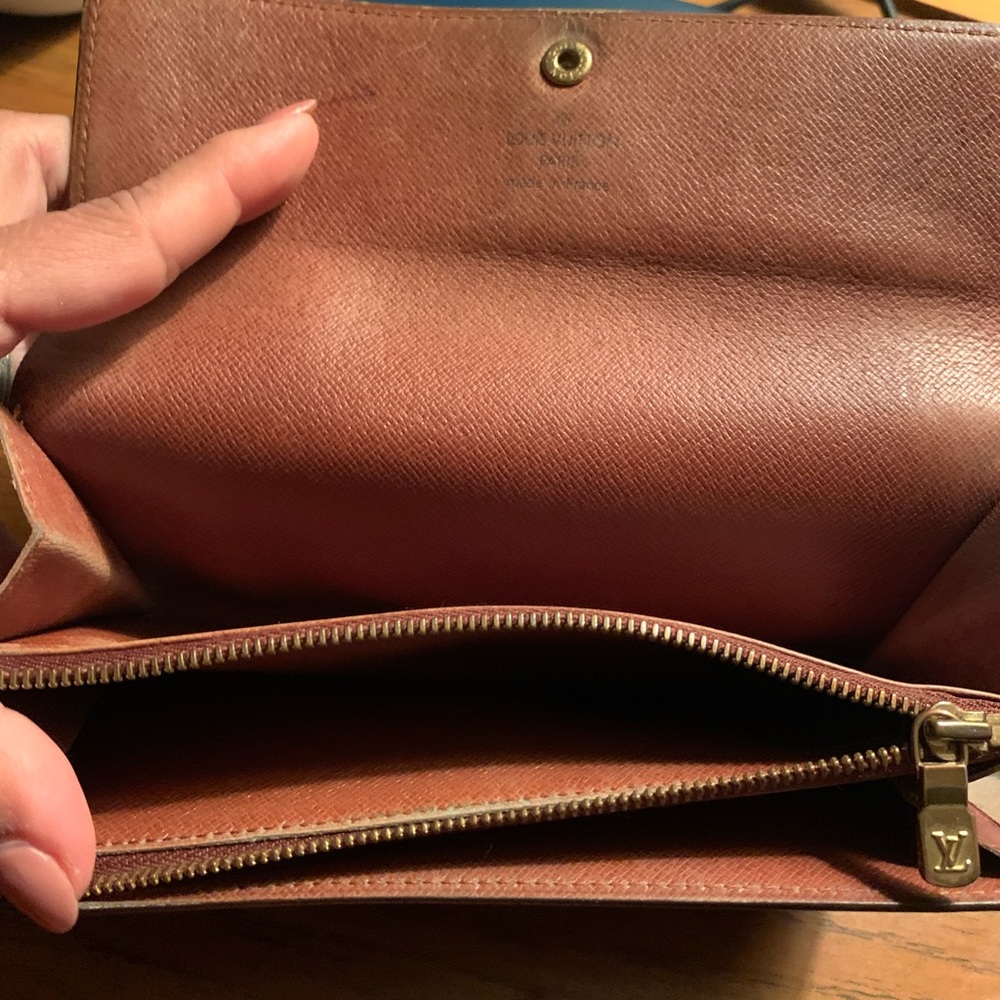 Lois Vuitton wallet authentic some sign of wear